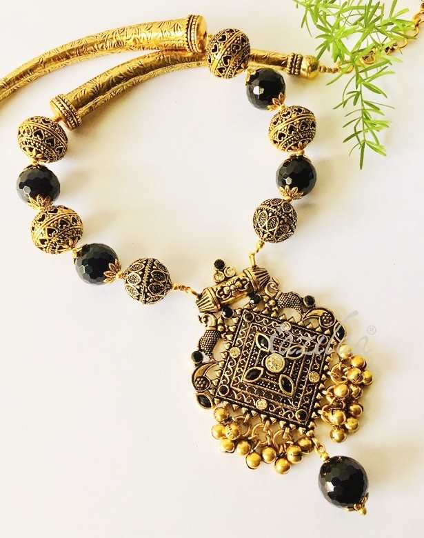 Black gemstone peacock antique gold tone necklace earrings set
